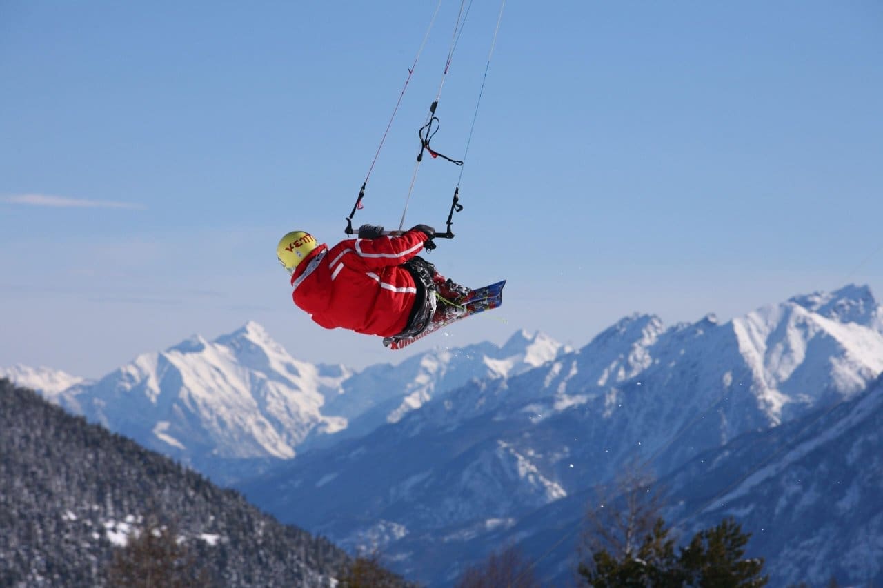 Adrenaline-rush activities in Aosta Valley - snowkiting in Vetan. Credit Maestri di Sci in Kiteski Celesia